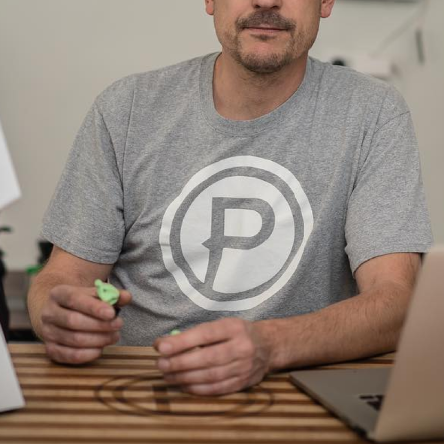 Justin Kudding and Simon Fisk sitting with Plunge logo in the middle.