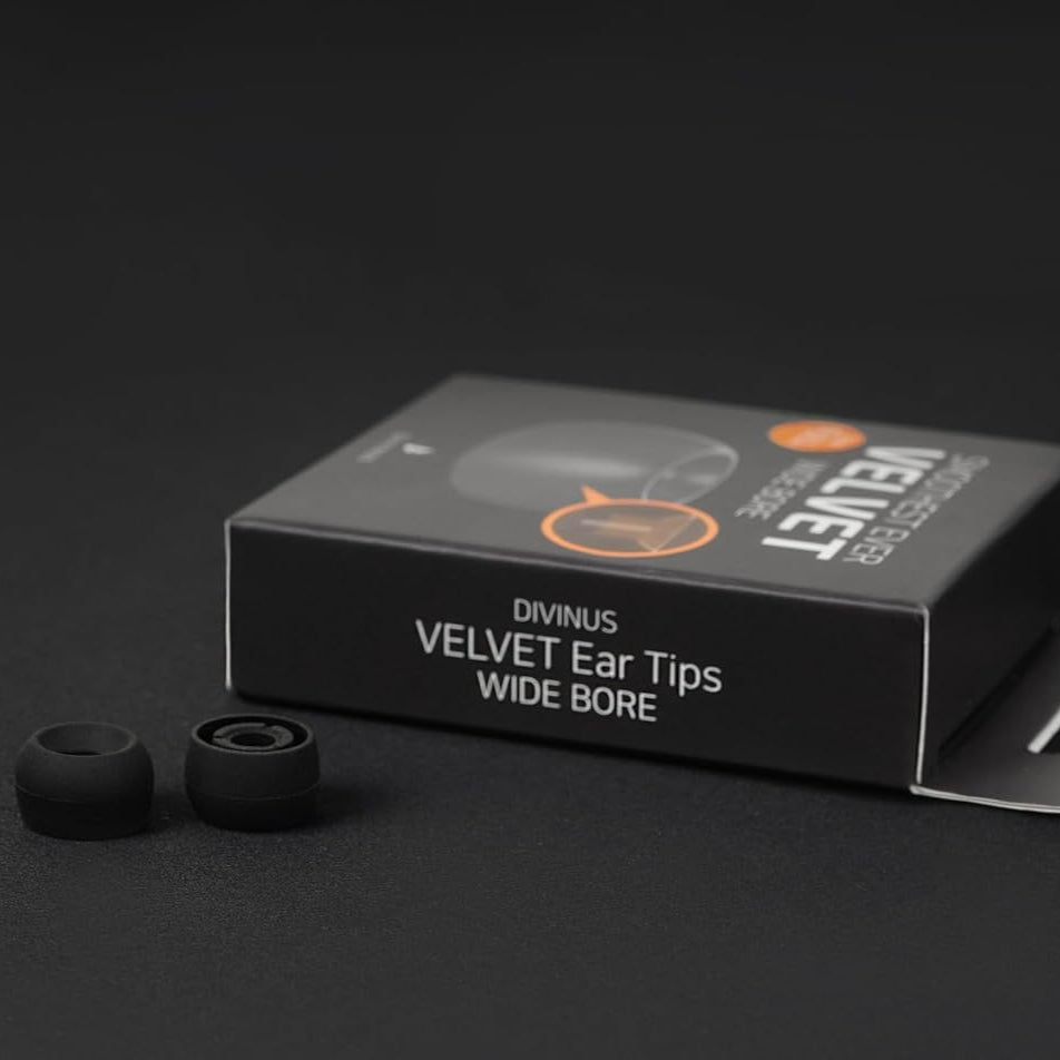 Divinus Velvet IEM Tip box and pair resting on black background.