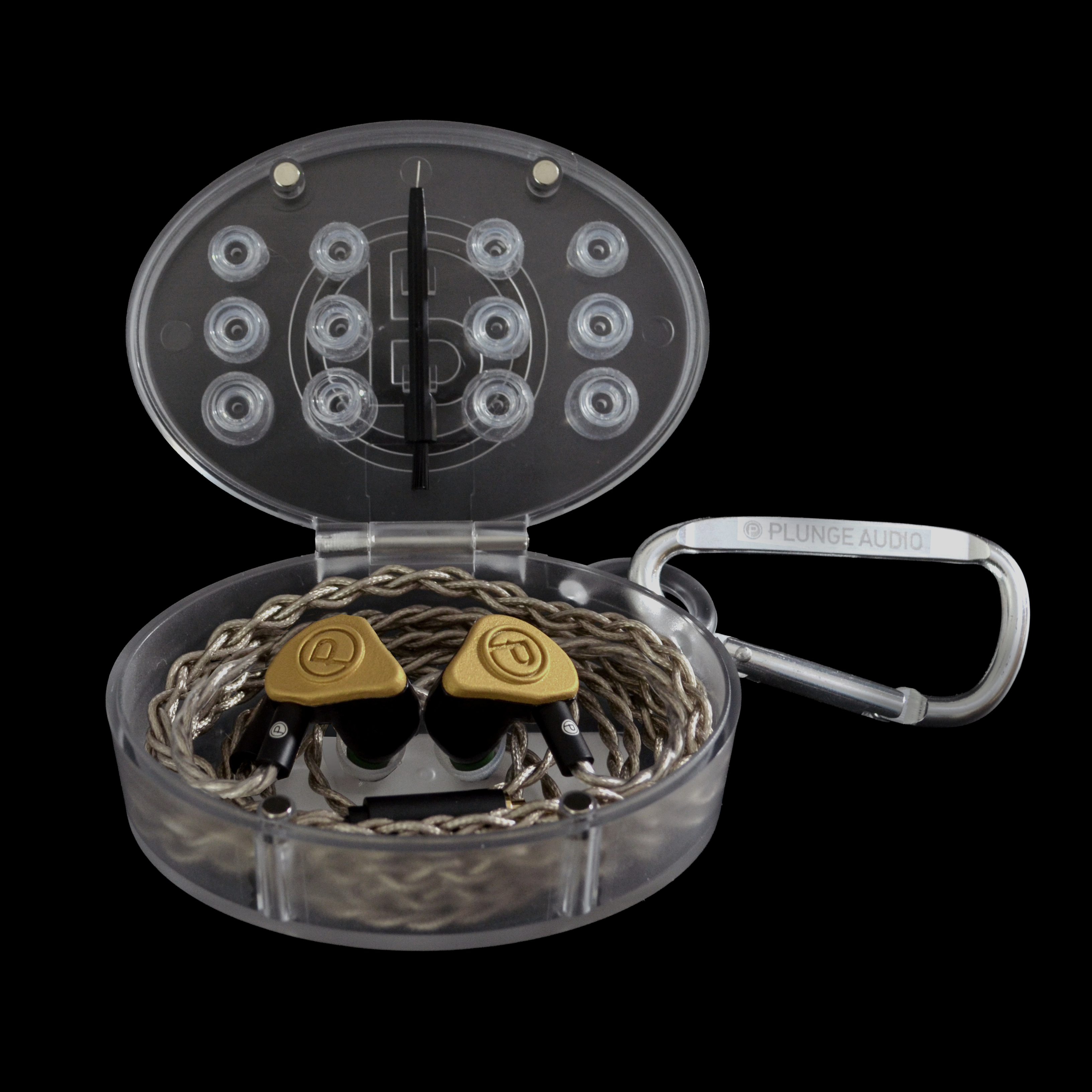 Clear open case with gold IEMs on a black background