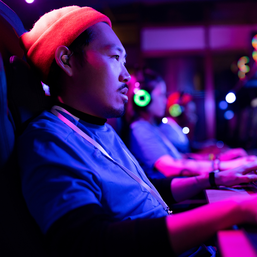 Gamer wearing Plunge Audio in-ear monitors (IEMs).