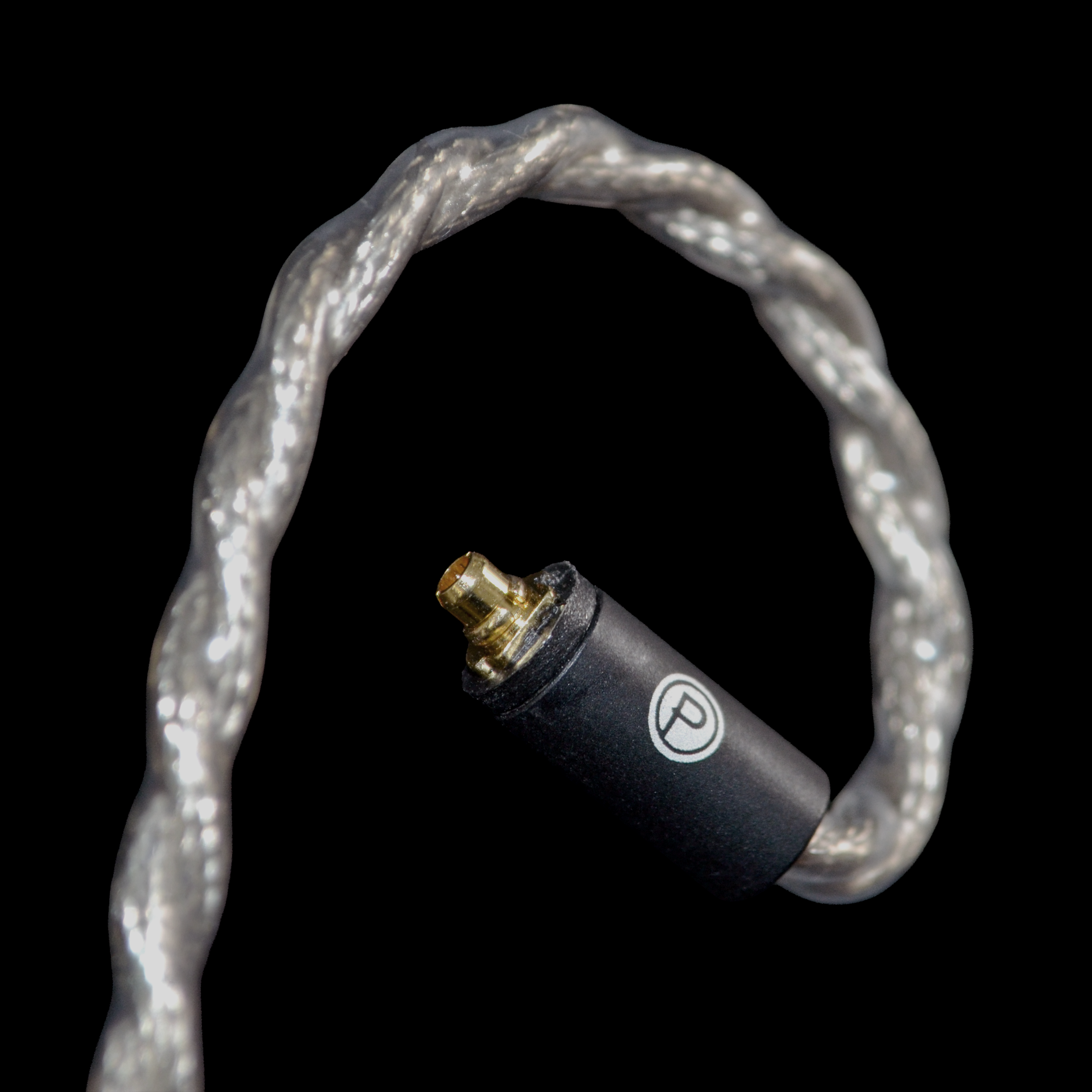 Black mmcx plug on a black background