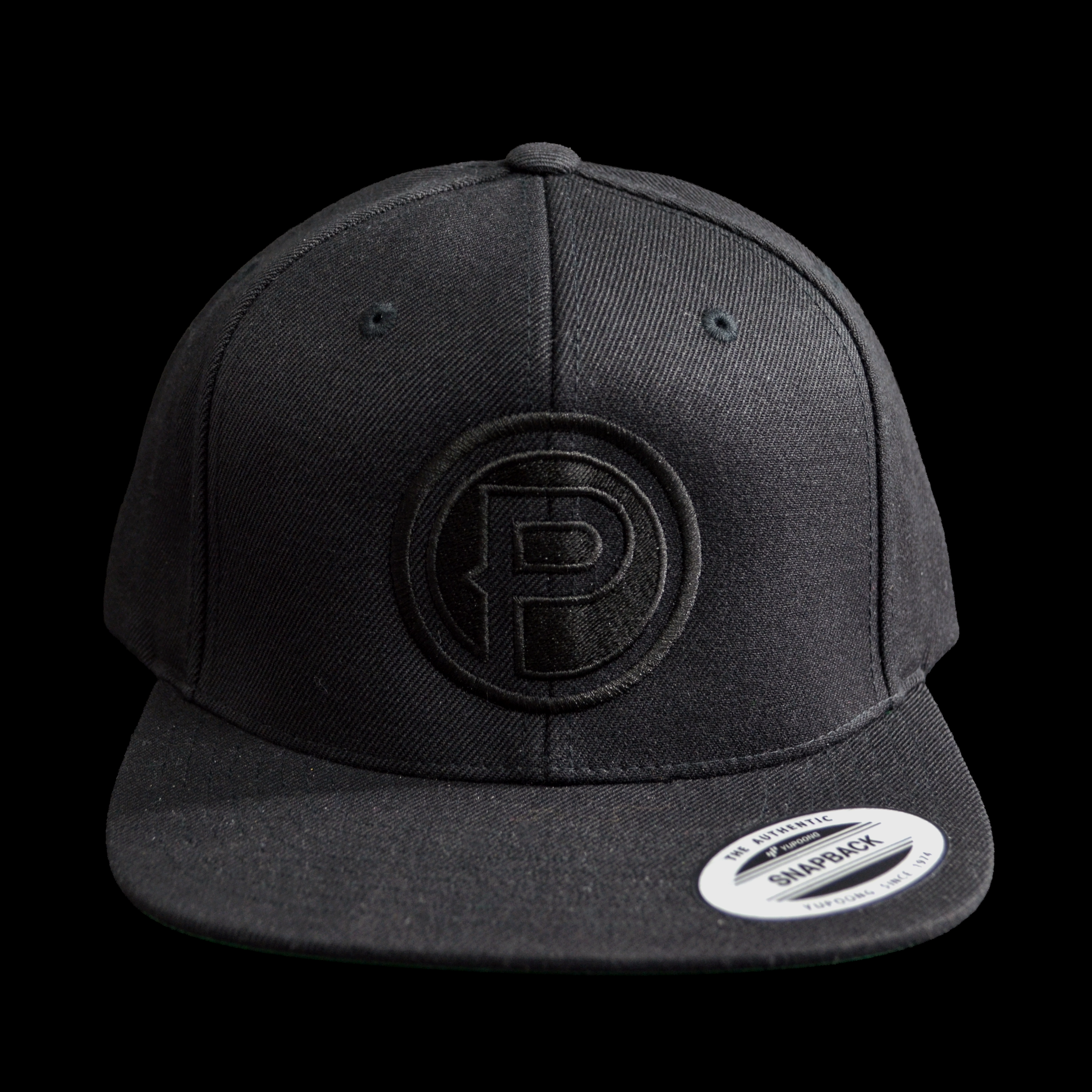 Black cap with a P logo on a black background
