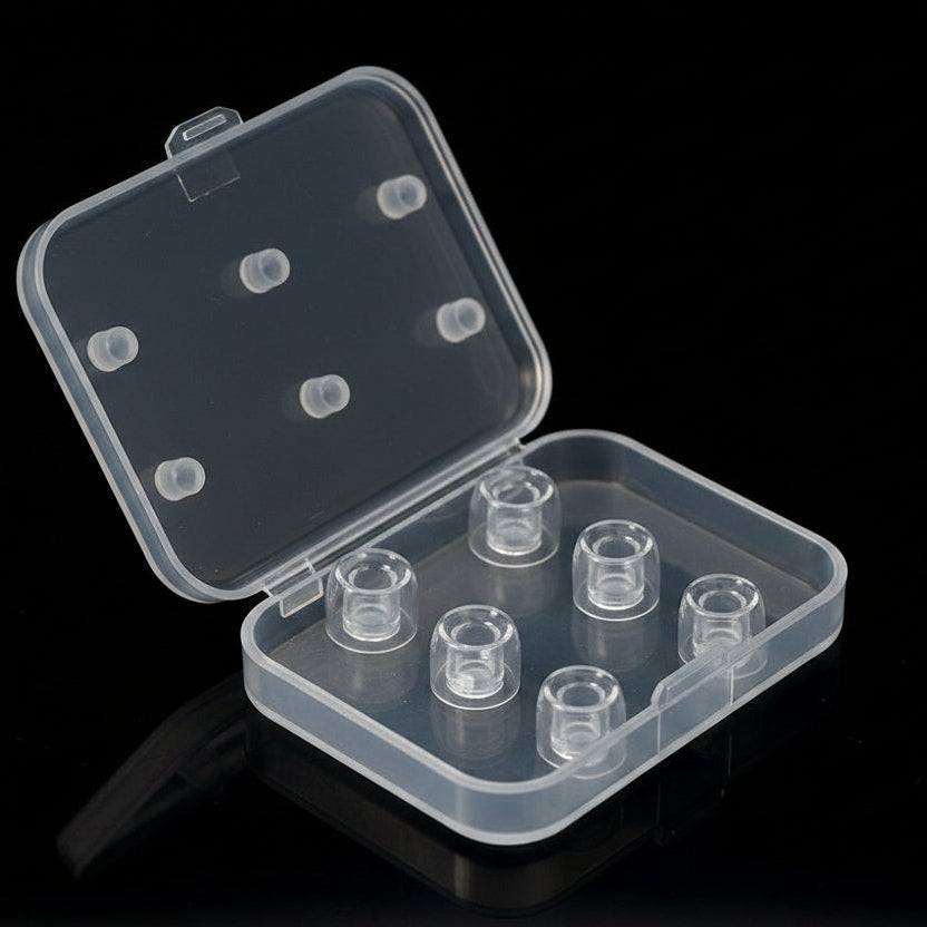 Clear plastic container with six clear IEM tips.